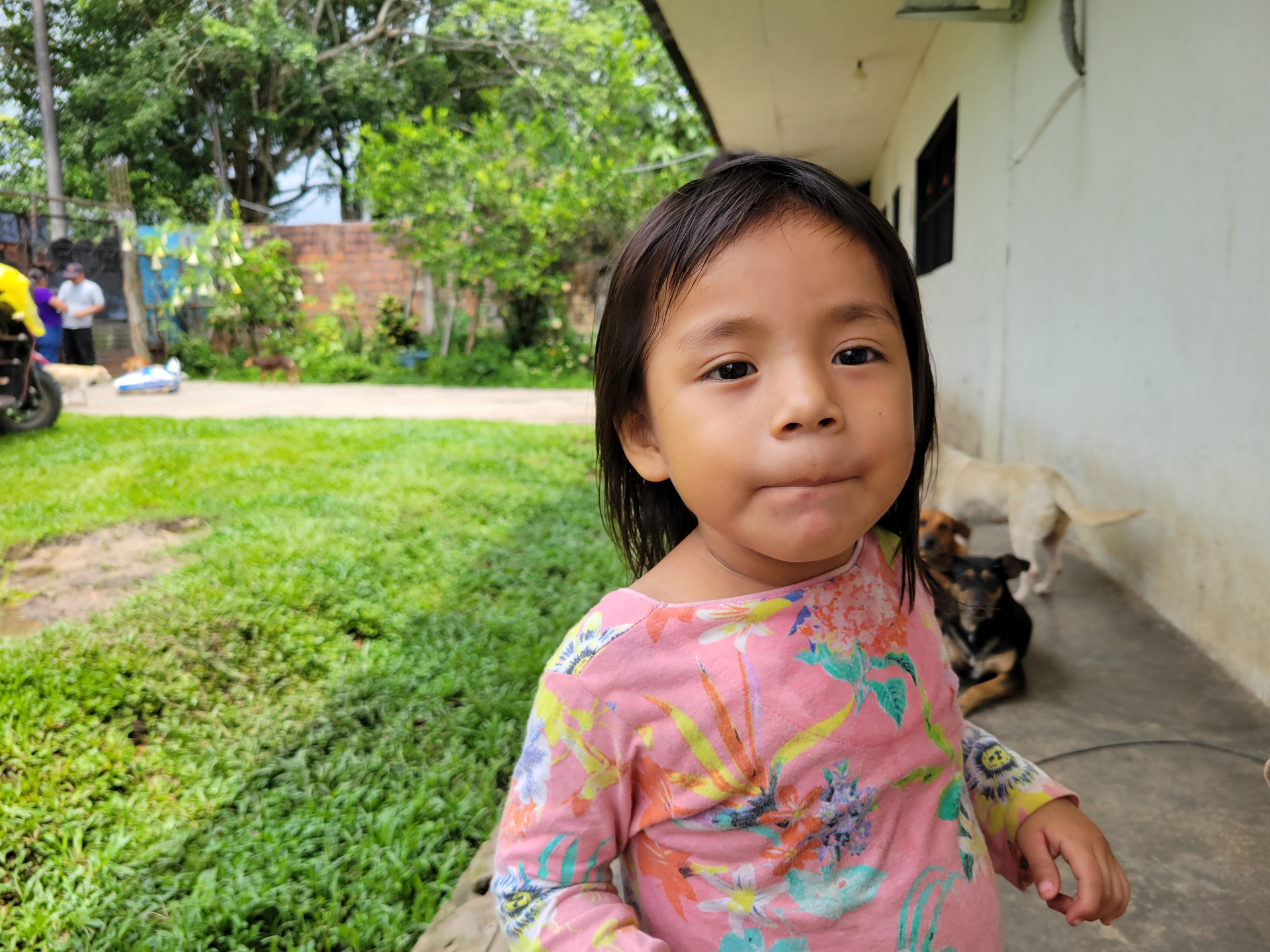 Young girl outdoors in a ministry community setting